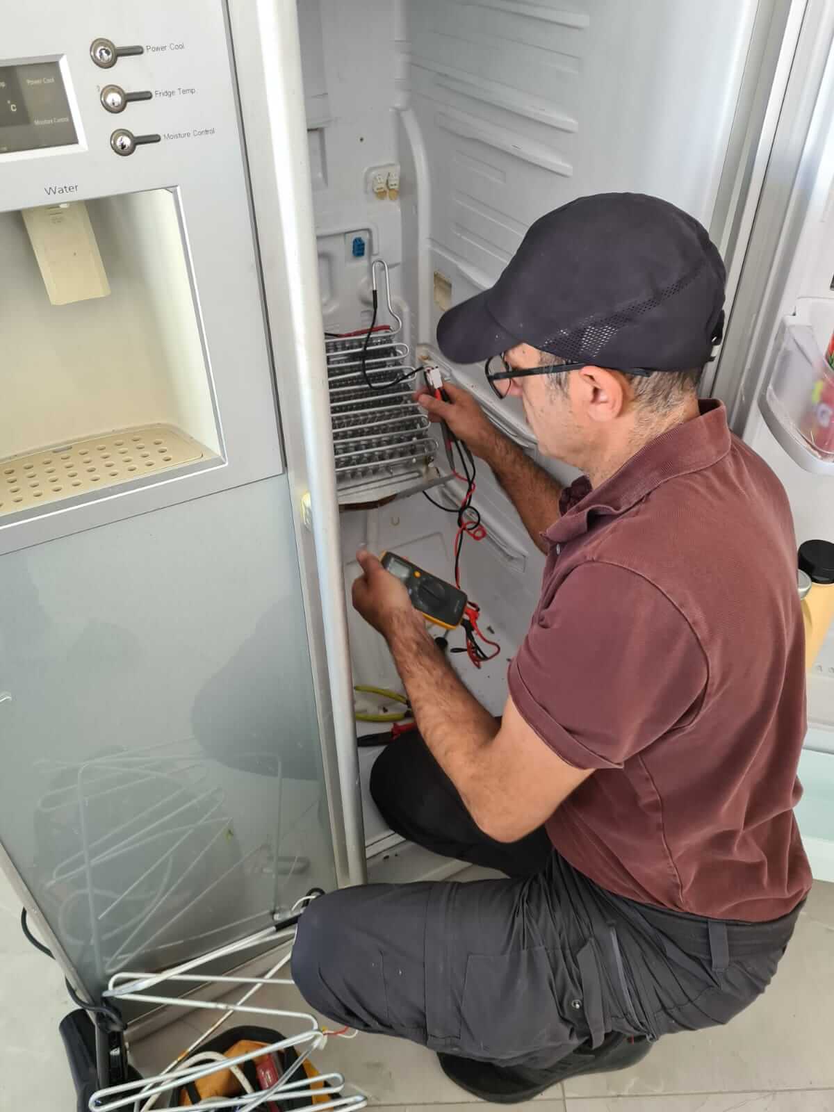 תיקון מייבש כביסה במהלך ביקור בית